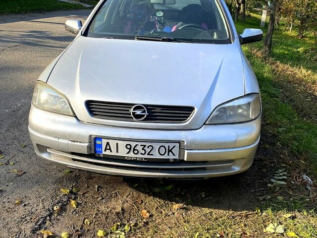 Серый Опель Астра, объемом двигателя 1.6 л и пробегом 316 тыс. км за 1800 $, фото 6 на Automoto.ua