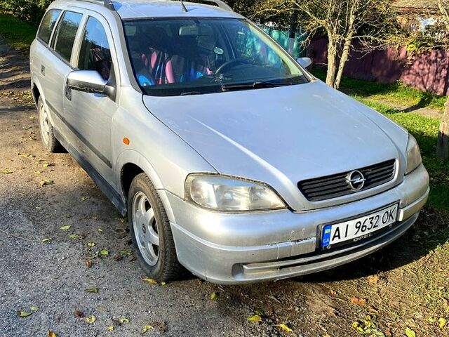 Серый Опель Астра, объемом двигателя 1.6 л и пробегом 316 тыс. км за 1800 $, фото 5 на Automoto.ua