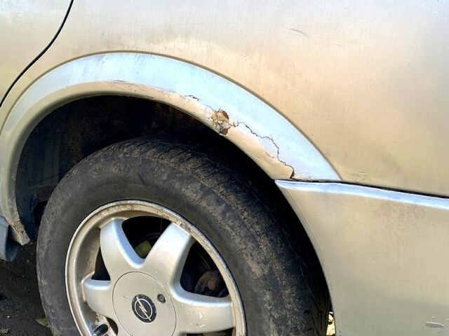 Серый Опель Астра, объемом двигателя 1.6 л и пробегом 316 тыс. км за 1800 $, фото 1 на Automoto.ua