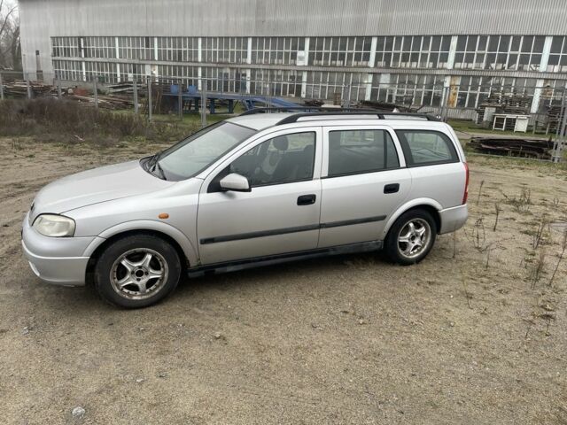 Серый Опель Астра, объемом двигателя 1.4 л и пробегом 250 тыс. км за 1900 $, фото 5 на Automoto.ua