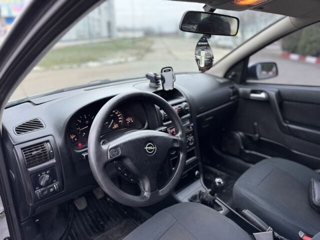 Серый Опель Астра, объемом двигателя 1.7 л и пробегом 275 тыс. км за 2199 $, фото 18 на Automoto.ua