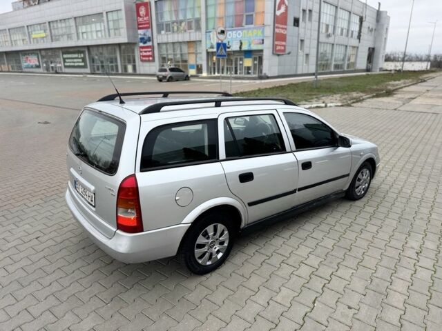 Серый Опель Астра, объемом двигателя 1.7 л и пробегом 275 тыс. км за 2199 $, фото 5 на Automoto.ua