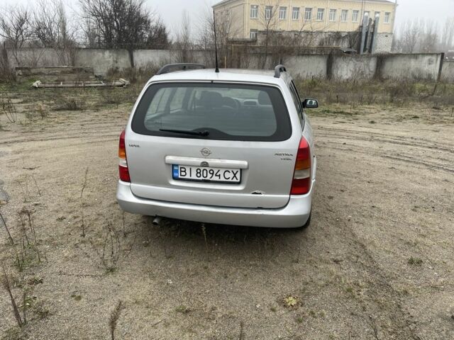 Серый Опель Астра, объемом двигателя 1.4 л и пробегом 250 тыс. км за 1900 $, фото 3 на Automoto.ua