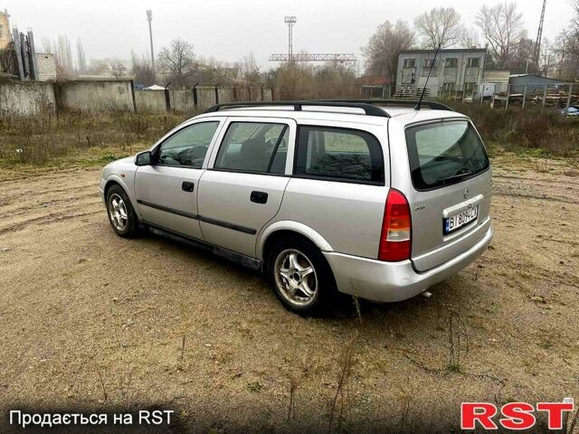 Серый Опель Астра, объемом двигателя 1.4 л и пробегом 200 тыс. км за 1900 $, фото 2 на Automoto.ua