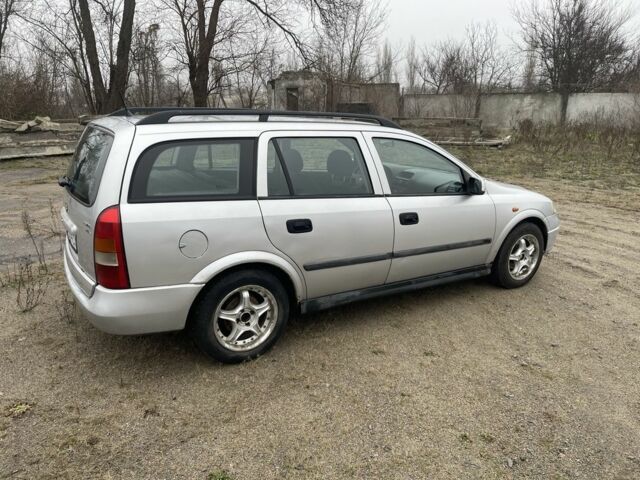 Серый Опель Астра, объемом двигателя 1.4 л и пробегом 250 тыс. км за 1900 $, фото 4 на Automoto.ua