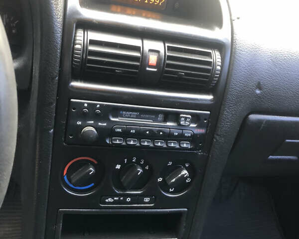 Серый Опель Астра, объемом двигателя 1.6 л и пробегом 323 тыс. км за 1700 $, фото 12 на Automoto.ua