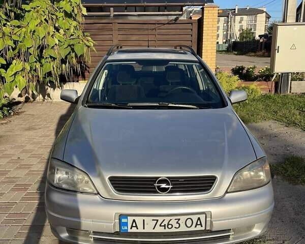 Серый Опель Астра, объемом двигателя 2 л и пробегом 283 тыс. км за 3100 $, фото 3 на Automoto.ua