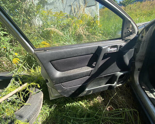 Серый Опель Астра, объемом двигателя 0 л и пробегом 300 тыс. км за 300 $, фото 6 на Automoto.ua