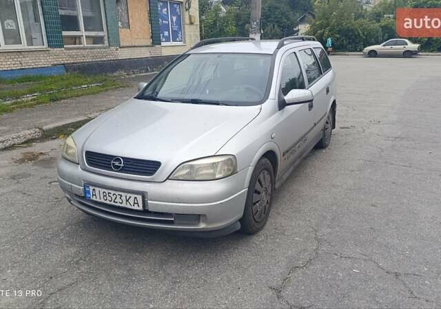Серый Опель Астра, объемом двигателя 1.4 л и пробегом 300 тыс. км за 2400 $, фото 16 на Automoto.ua