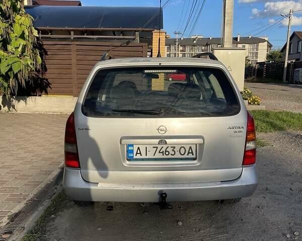 Серый Опель Астра, объемом двигателя 2 л и пробегом 283 тыс. км за 3100 $, фото 2 на Automoto.ua