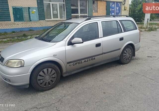 Серый Опель Астра, объемом двигателя 1.4 л и пробегом 300 тыс. км за 2400 $, фото 17 на Automoto.ua