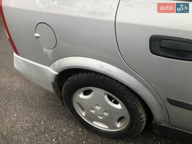 Серый Опель Астра, объемом двигателя 1.6 л и пробегом 323 тыс. км за 1700 $, фото 8 на Automoto.ua