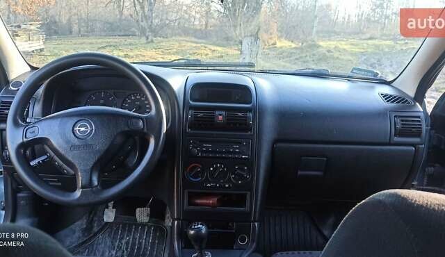 Серый Опель Астра, объемом двигателя 2 л и пробегом 300 тыс. км за 3000 $, фото 5 на Automoto.ua