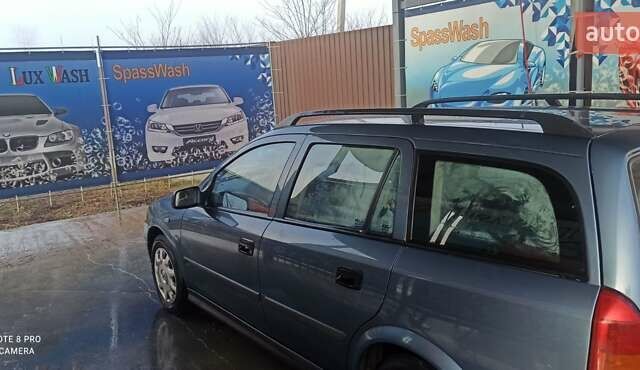 Серый Опель Астра, объемом двигателя 2 л и пробегом 300 тыс. км за 3000 $, фото 1 на Automoto.ua