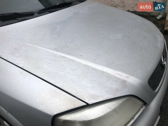 Серый Опель Астра, объемом двигателя 1.6 л и пробегом 323 тыс. км за 1700 $, фото 5 на Automoto.ua