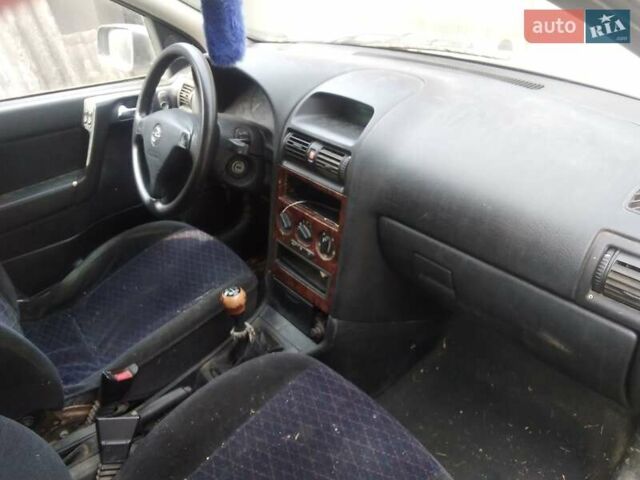 Серый Опель Астра, объемом двигателя 2 л и пробегом 350 тыс. км за 800 $, фото 4 на Automoto.ua