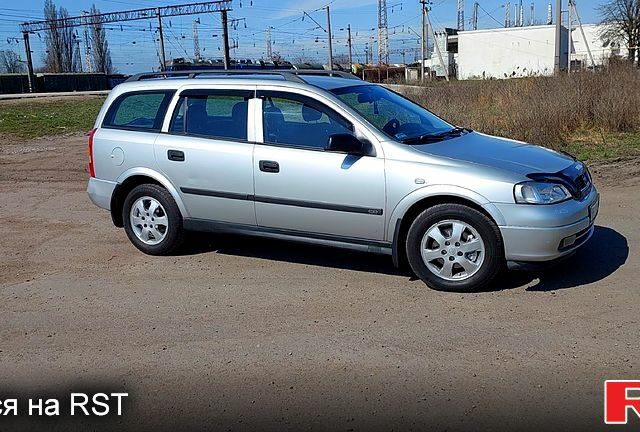 Серый Опель Астра, объемом двигателя 2 л и пробегом 300 тыс. км за 3300 $, фото 1 на Automoto.ua