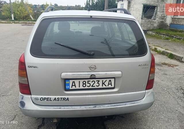 Серый Опель Астра, объемом двигателя 1.4 л и пробегом 300 тыс. км за 2400 $, фото 18 на Automoto.ua