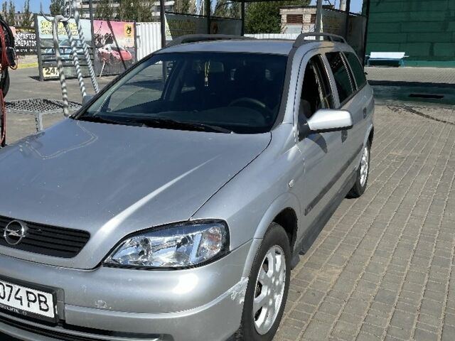 Серый Опель Астра, объемом двигателя 2 л и пробегом 392 тыс. км за 3125 $, фото 1 на Automoto.ua