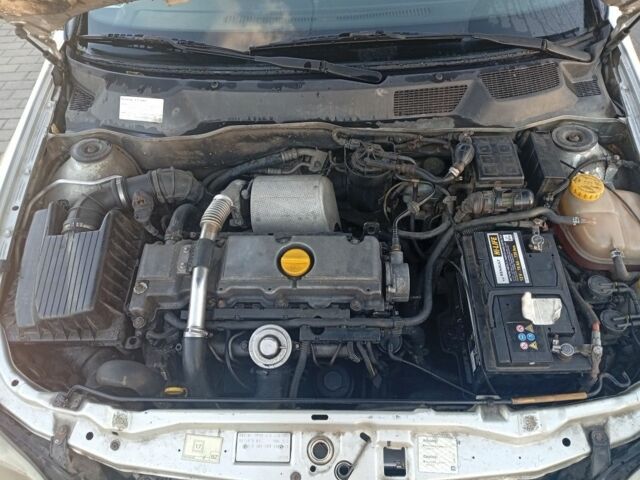 Серый Опель Астра, объемом двигателя 2 л и пробегом 320 тыс. км за 1350 $, фото 2 на Automoto.ua