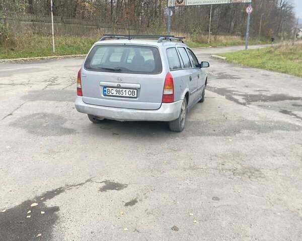 Серый Опель Астра, объемом двигателя 1.8 л и пробегом 485 тыс. км за 1600 $, фото 2 на Automoto.ua