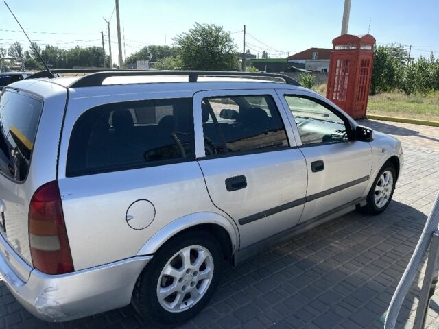 Серый Опель Астра, объемом двигателя 2 л и пробегом 392 тыс. км за 3125 $, фото 3 на Automoto.ua