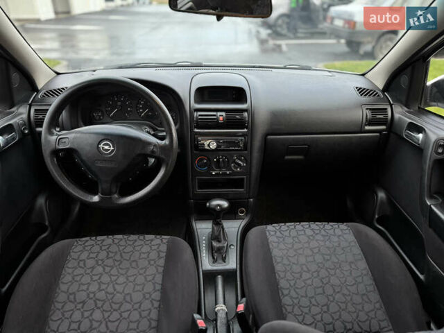 Серый Опель Астра, объемом двигателя 1.6 л и пробегом 330 тыс. км за 2999 $, фото 19 на Automoto.ua