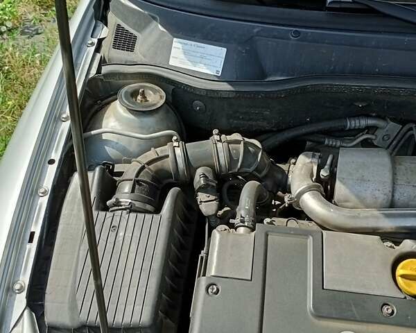 Серый Опель Астра, объемом двигателя 2 л и пробегом 390 тыс. км за 4500 $, фото 25 на Automoto.ua