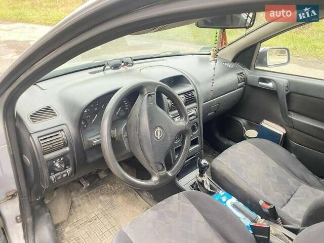 Серый Опель Астра, объемом двигателя 1.8 л и пробегом 485 тыс. км за 1600 $, фото 6 на Automoto.ua