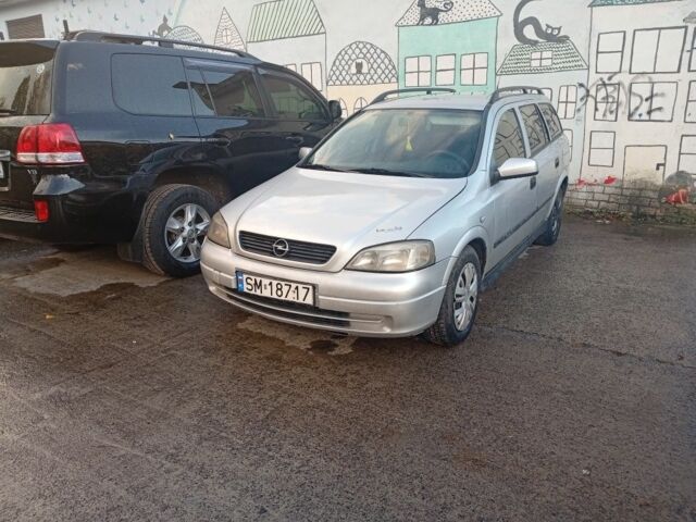 Серый Опель Астра, объемом двигателя 2 л и пробегом 320 тыс. км за 1350 $, фото 1 на Automoto.ua