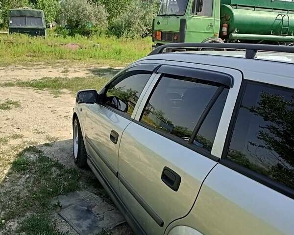 Серый Опель Астра, объемом двигателя 2 л и пробегом 390 тыс. км за 4500 $, фото 34 на Automoto.ua