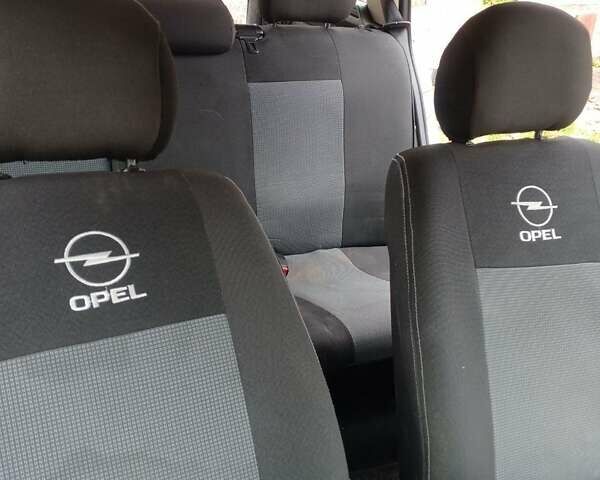 Серый Опель Астра, объемом двигателя 1.6 л и пробегом 330 тыс. км за 2500 $, фото 12 на Automoto.ua