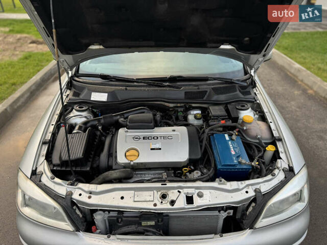 Серый Опель Астра, объемом двигателя 1.6 л и пробегом 330 тыс. км за 2999 $, фото 21 на Automoto.ua