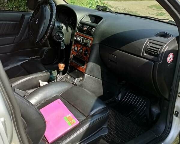 Серый Опель Астра, объемом двигателя 2 л и пробегом 390 тыс. км за 4500 $, фото 26 на Automoto.ua