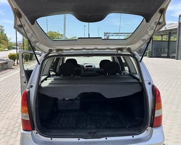 Серый Опель Астра, объемом двигателя 1.6 л и пробегом 323 тыс. км за 1700 $, фото 8 на Automoto.ua