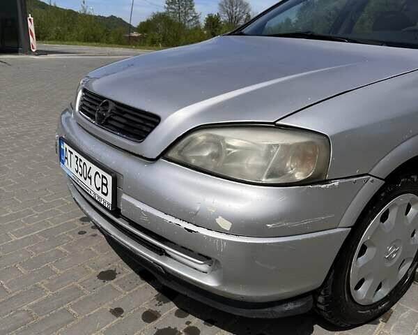 Серый Опель Астра, объемом двигателя 1.6 л и пробегом 323 тыс. км за 1700 $, фото 10 на Automoto.ua