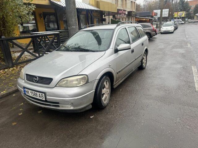 Серый Опель Астра, объемом двигателя 2 л и пробегом 370 тыс. км за 1550 $, фото 2 на Automoto.ua