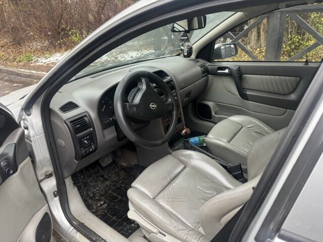 Серый Опель Астра, объемом двигателя 2 л и пробегом 370 тыс. км за 1550 $, фото 1 на Automoto.ua