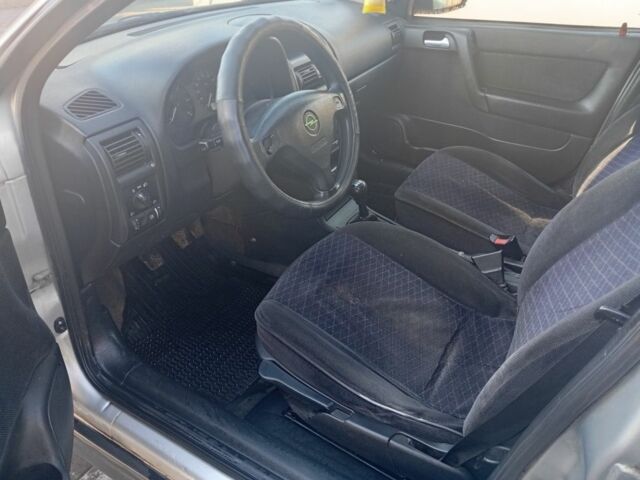 Серый Опель Астра, объемом двигателя 2 л и пробегом 320 тыс. км за 1350 $, фото 4 на Automoto.ua