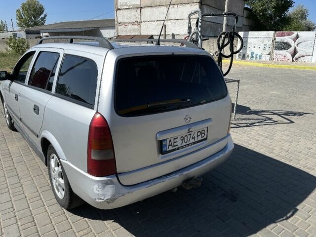 Серый Опель Астра, объемом двигателя 2 л и пробегом 392 тыс. км за 3125 $, фото 4 на Automoto.ua