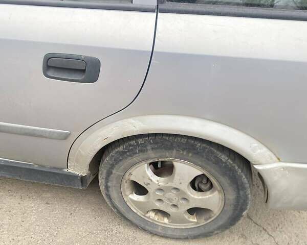 Серый Опель Астра, объемом двигателя 1.8 л и пробегом 485 тыс. км за 1600 $, фото 8 на Automoto.ua