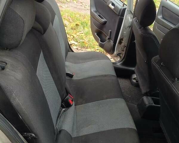 Серый Опель Астра, объемом двигателя 1.6 л и пробегом 330 тыс. км за 2500 $, фото 8 на Automoto.ua