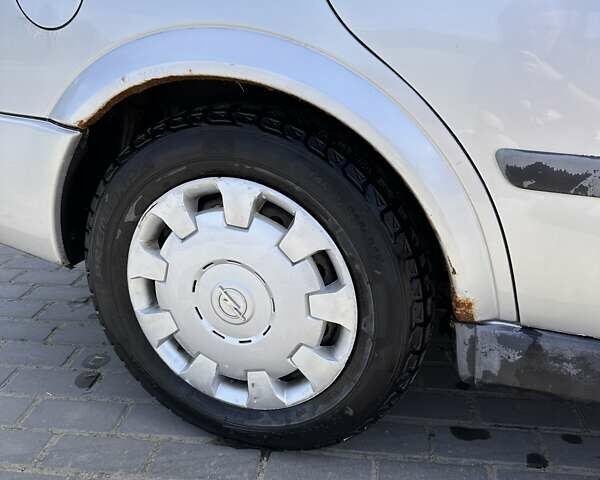 Серый Опель Астра, объемом двигателя 1.6 л и пробегом 323 тыс. км за 1700 $, фото 11 на Automoto.ua