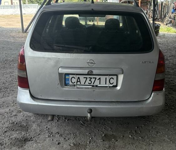 Сірий Опель Астра, об'ємом двигуна 2 л та пробігом 400 тис. км за 2206 $, фото 5 на Automoto.ua