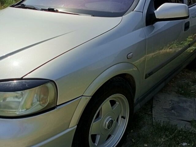 Сірий Опель Астра, об'ємом двигуна 2 л та пробігом 390 тис. км за 3899 $, фото 36 на Automoto.ua