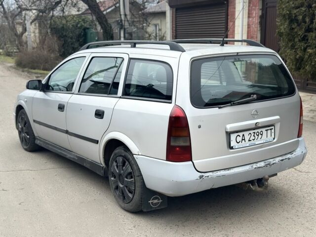 Серый Опель Астра, объемом двигателя 1.9 л и пробегом 350 тыс. км за 950 $, фото 3 на Automoto.ua