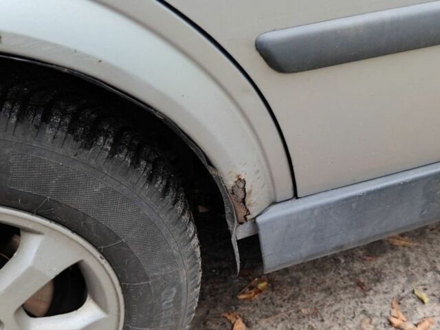 Серый Опель Астра, объемом двигателя 2 л и пробегом 392 тыс. км за 3125 $, фото 5 на Automoto.ua