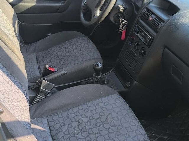 Сірий Опель Астра, об'ємом двигуна 2 л та пробігом 362 тис. км за 1401 $, фото 5 на Automoto.ua