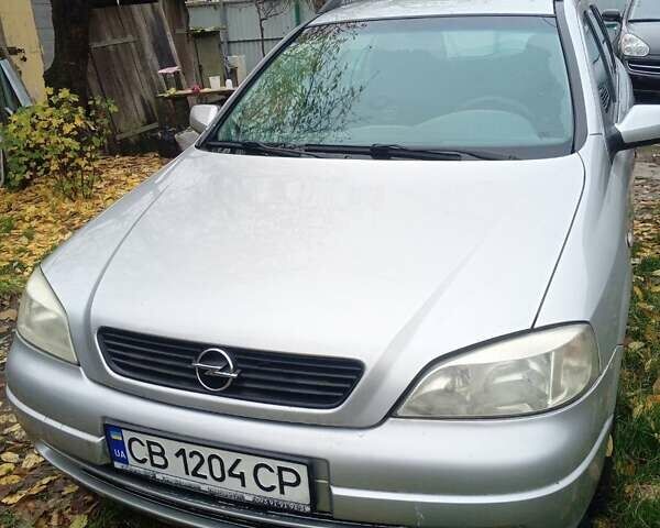 Серый Опель Астра, объемом двигателя 1.6 л и пробегом 330 тыс. км за 2500 $, фото 10 на Automoto.ua