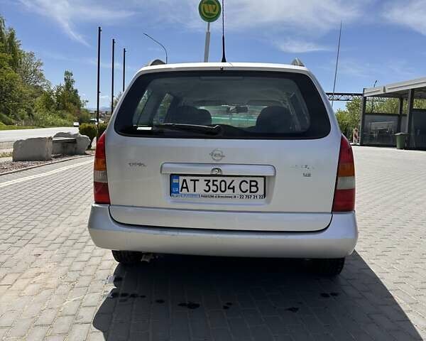 Серый Опель Астра, объемом двигателя 1.6 л и пробегом 323 тыс. км за 1700 $, фото 7 на Automoto.ua